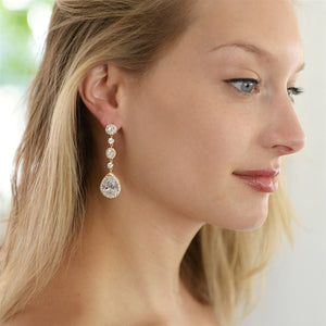Cubic Zirconia Pear-shaped Drop Earrings with Micro-Pave in Gold or Silver Finish By The Ring Madam 